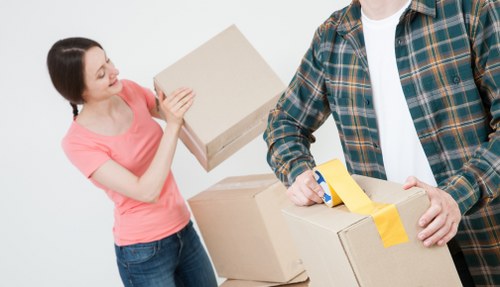 Professional movers loading a removal truck
