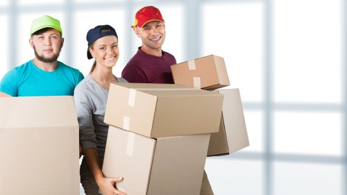 Packing process with boxes labeled in Storage Barnet