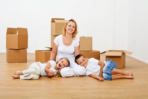 Professional movers handling furniture in Storage Barnet