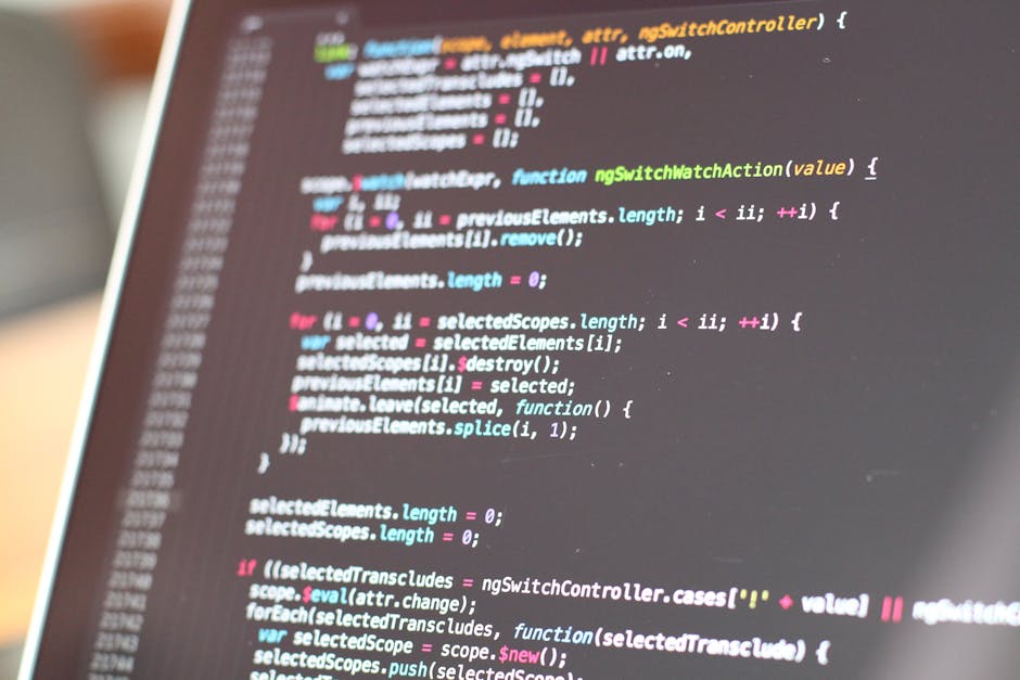 Close-up view of a computer screen displaying lines of HTML code in various colors including pink, green, and white. The code includes links to image sliders, testimonial sections, and video sliders, 